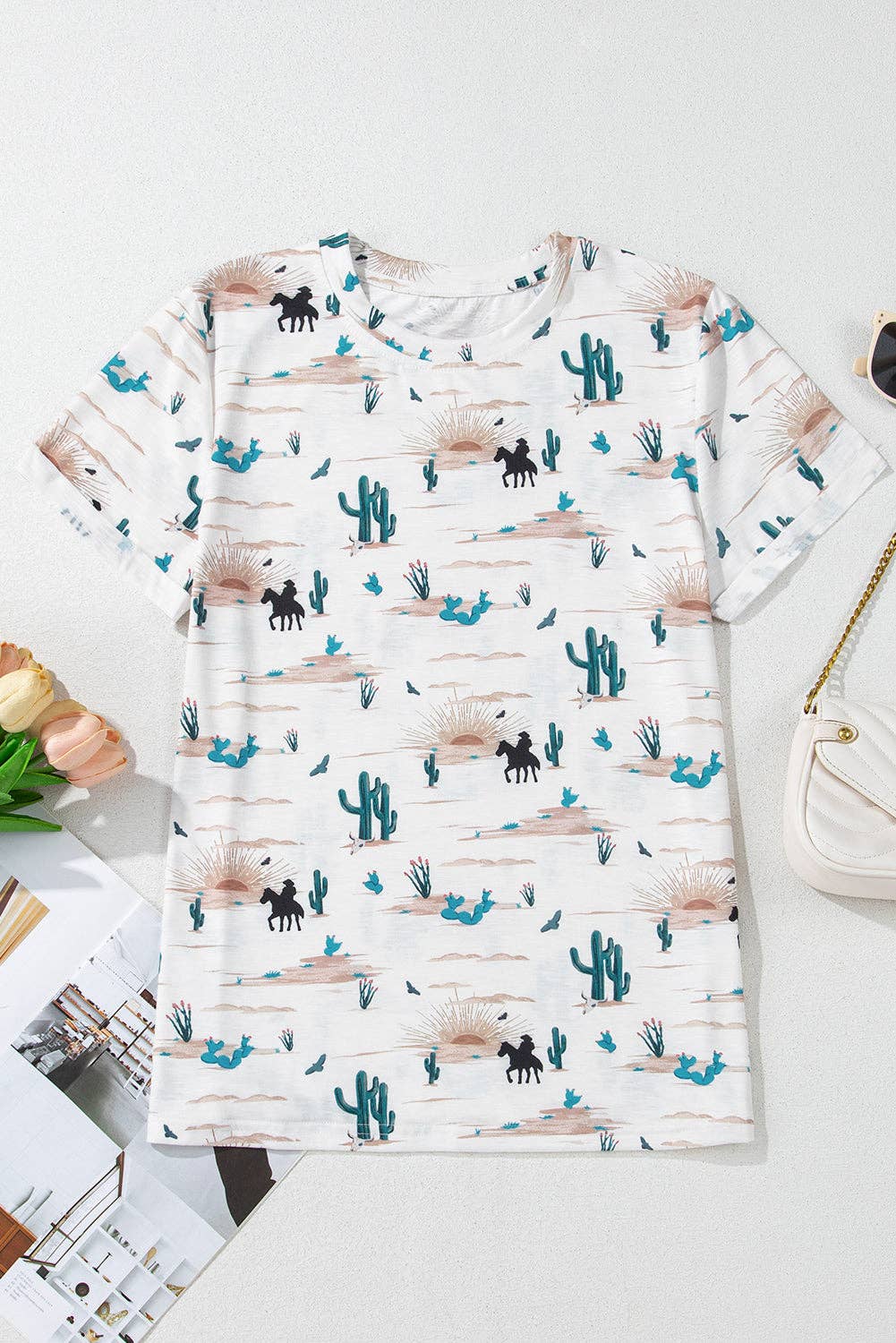 Dress with cactus and horse pattern on a white surface