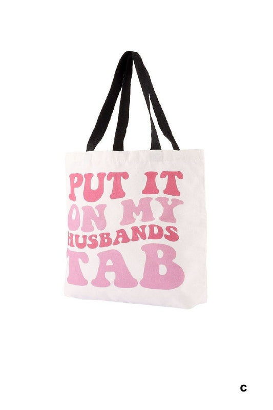 Tote bag with pink text on a white background