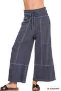 Dark blue wide-leg pants with a drawstring waist on a white background.