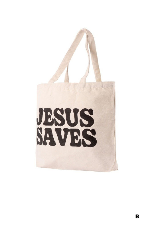 Beige tote bag with 'JESUS SAVES' text on a white background