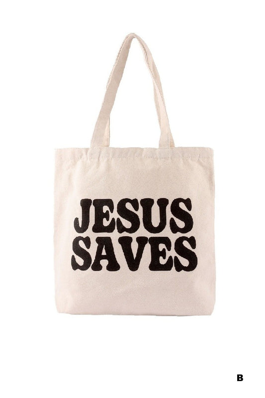 Beige tote bag with 'Jesus Saves' text on a white background